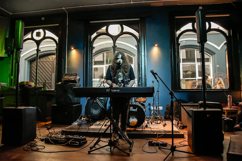 Miabella band performing live on stage